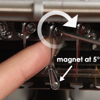 Use the magnet as a guide and tighten the clamp.